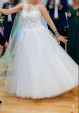 Suknia ślubna Sprzedam suknię ślubną kolor: Biala rozmiar: 40