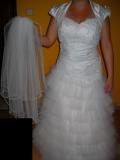 Suknia ślubna Sprzedam suknie ślubną kolor: Biały rozmiar: 40/42/44