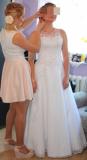 Suknia ślubna Sprzedam piękną suknię ślubną kolor: biały rozmiar: 38-40